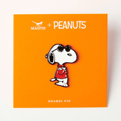 Joe Cool pin on its orange Magpie x Peanuts card