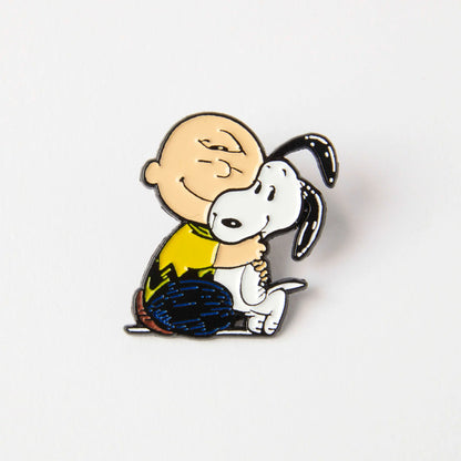 Peanuts Be Kind enamel pin: Charlie Brown hugging Snoopy