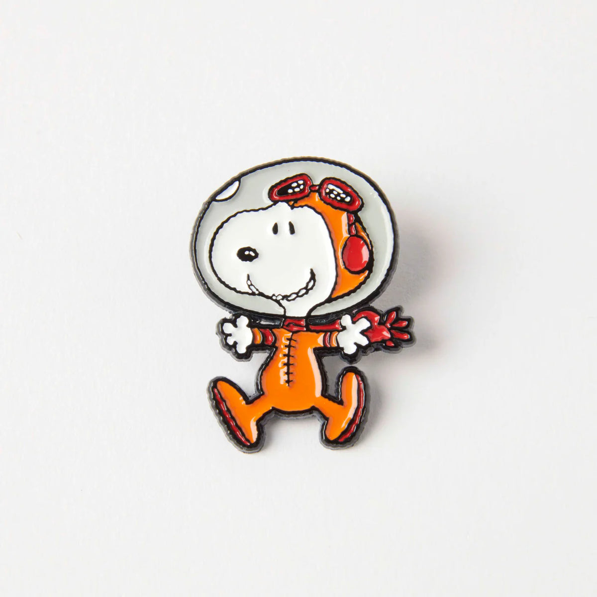Enamel pin of Snoopy as an astronaut in an orange suit