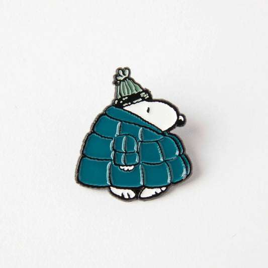 Peanuts enamel pin: Snoopy in a teal puffer coat and bobble hat