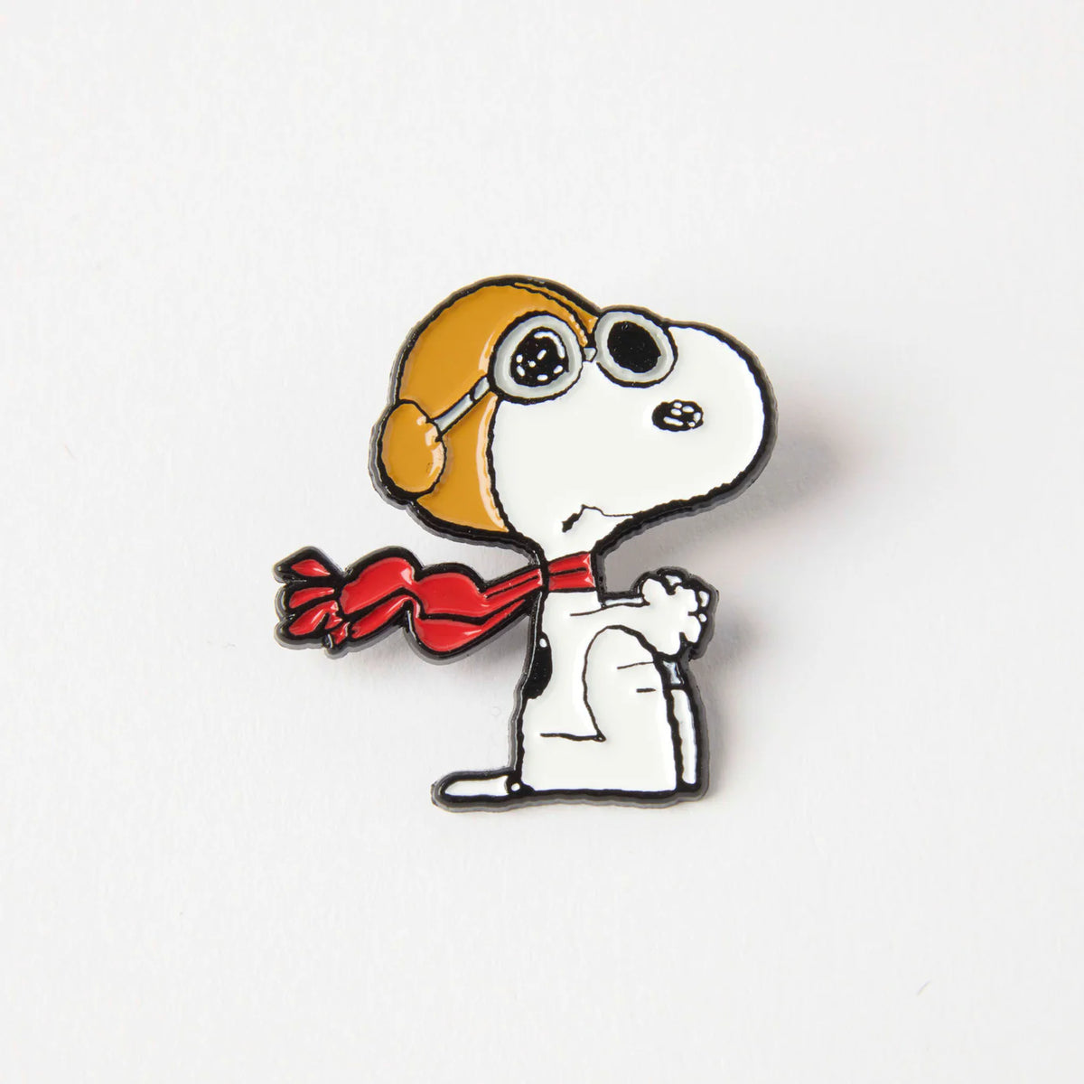 Enamel pin of Snoopy as the Flying Ace in goggles and red scarf