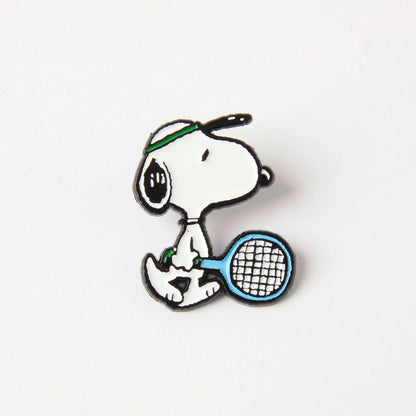 Peanuts tennis enamel pin: Snoopy in a sweatband holding a tennis racket