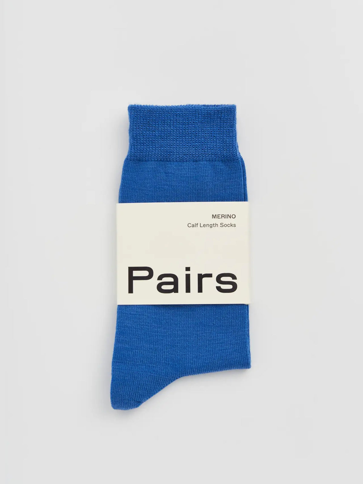 Pairs merino calf socks in strong blue, medium, with a Pairs paper band