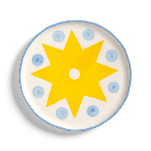 &K Festivo small plate in white with a yellow star and light blue dots