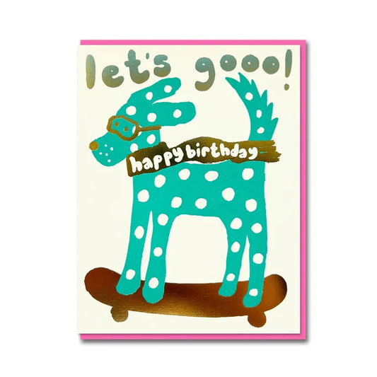 Birthday card with a teal spotty dog in goggles riding a skateboard: let's gooo! happy birthday