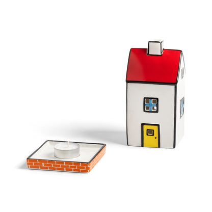 Townhouse lifted off its base to show the tealight
