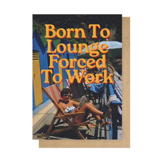 East End Prints card: a woman sunbathing in a deckchair by beach huts, with 'Born to lounge, forced to work'