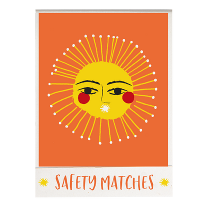 Match book cover: a smiling sun on orange: Safety matches