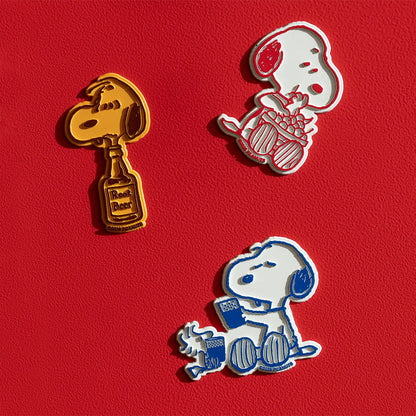 Snoopy magnets including the cheers magnet on red