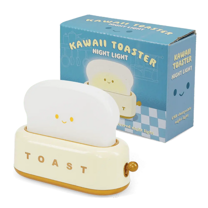 Rex Kawaii Toaster night light: a smiling bread slice in a cream toaster reading 'Toast', beside its box