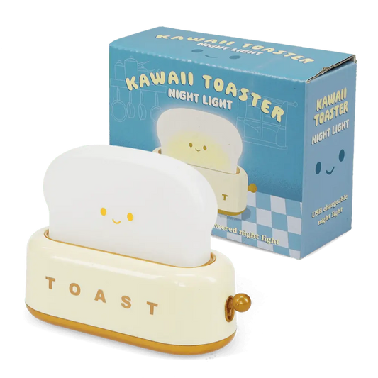 Rex Kawaii Toaster night light: a smiling bread slice in a cream toaster reading 'Toast', beside its box