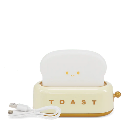 Toaster night light with its USB charging cable