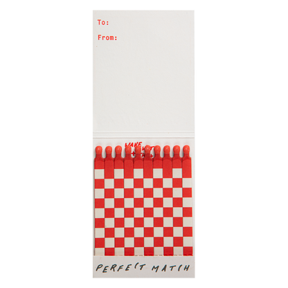 Inside the Cowgirl match book with red and white matches and a To/From space