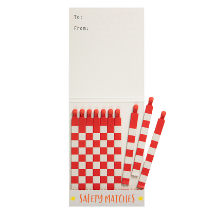 Sun match book open with a few red and white matches pulled out