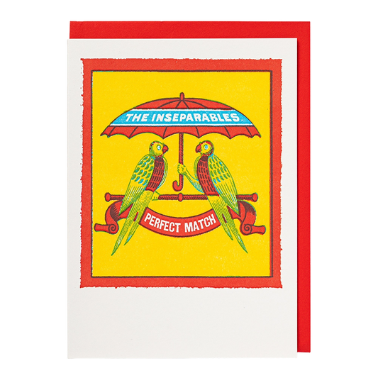 Archivist card: two parrots under an umbrella, with 'The inseparables – perfect match'