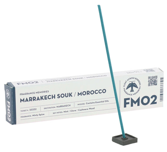 Fragrance Memories Marrakech Souk / Morocco incense box with a lit incense stick in a holder