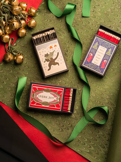 Christmas tree cat matchbox with other matchboxes, bells and green ribbon