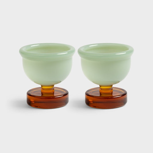 Klevering Cantine egg cups: two mint green glass cups on amber glass stems