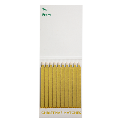 Inside the Christmas match book with gold matches and a To/From space