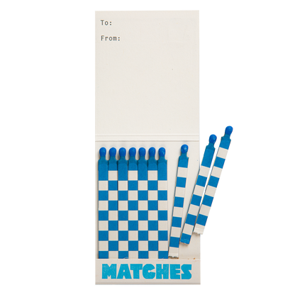 Paris match book open with a few blue and white matches pulled out