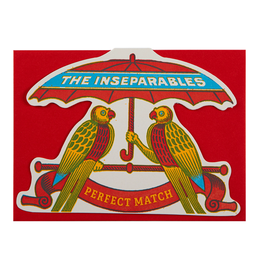 Archivist cut-out card: two parrots under an umbrella, with 'The inseparables – perfect match'