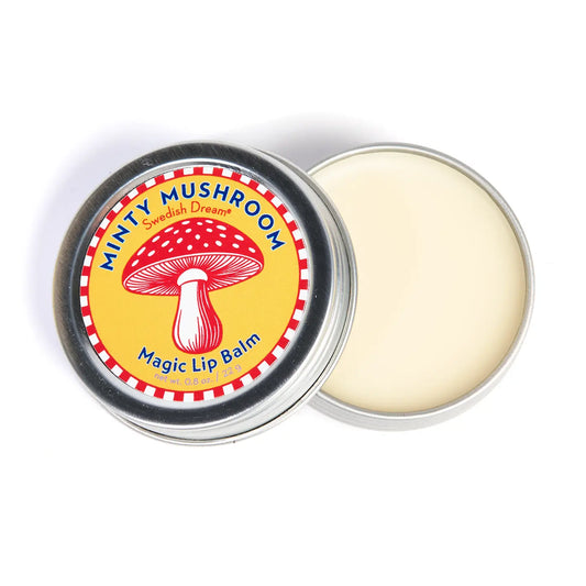Swedish Dream Minty Mushroom lip balm: an open tin with a red toadstool on the lid