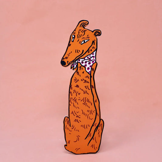 Orange leather greyhound bookmark wearing a spotted neckerchief