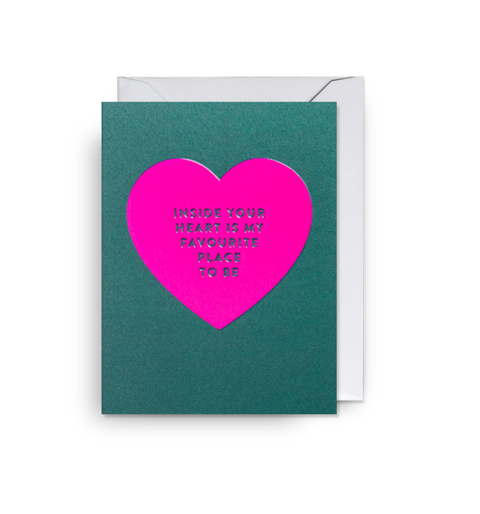 Lagom mini card: a neon pink heart on dark green, with a message about the inside of your heart being a favourite place