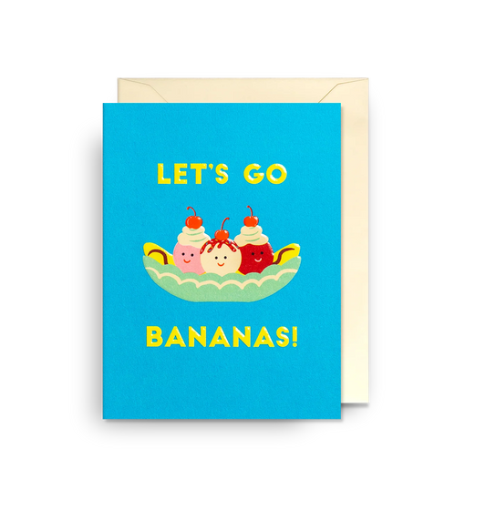 Lagom mini card: a banana split with smiling scoops, with 'Let's go bananas!' on blue