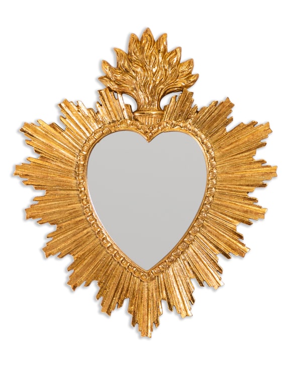 Gold sacred heart mirror with a sunburst frame and flame