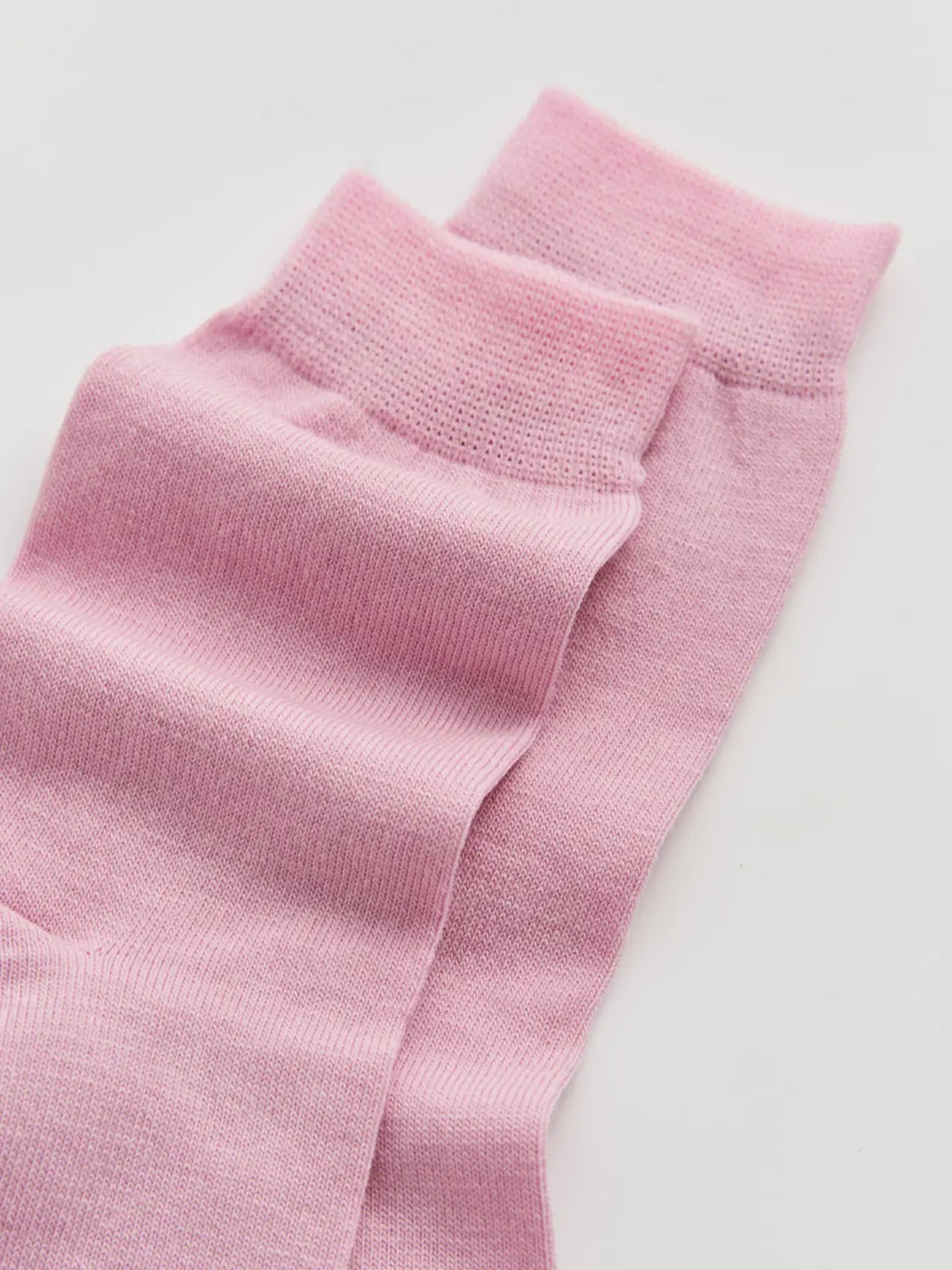 Close-up of the sugar pink merino knit