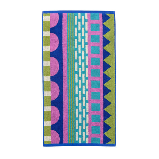 Donna Wilson Circus hand towel with blue, pink and green stripes, zigzags and circles