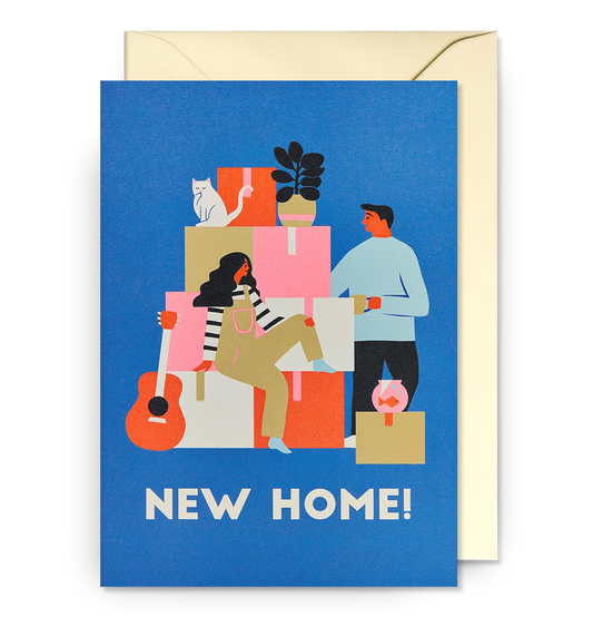 Lagom card: a couple carrying a pile of moving boxes with a cat, with 'New home!'