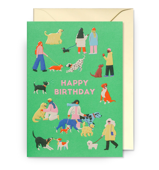 Lagom card: people walking many different dogs on green, with 'Happy birthday'