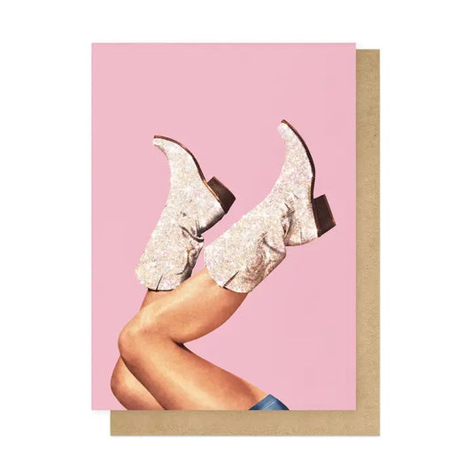 East End Prints card: legs in sparkly silver cowboy boots kicking up against pink