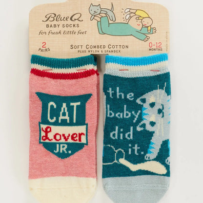 Blue Q baby socks, two pairs: pink 'Cat lover Jr.' and blue 'The baby did it' with a cat