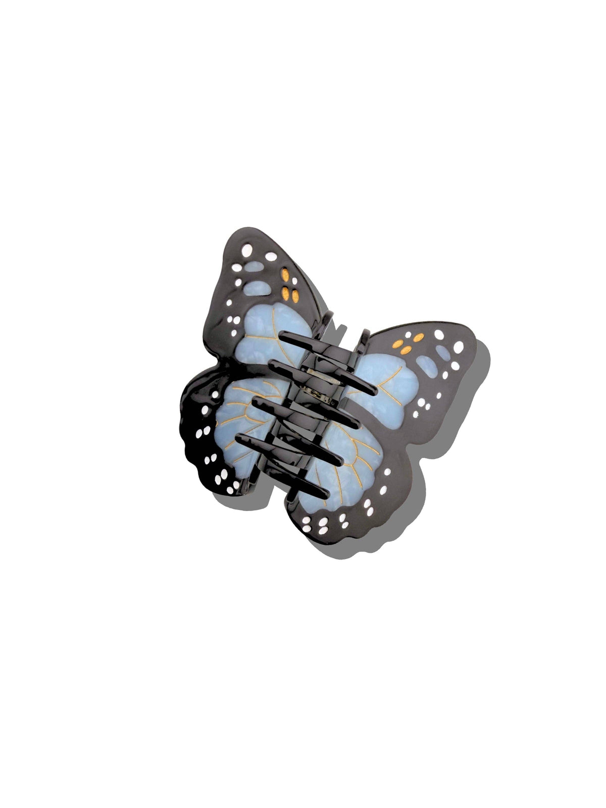 Back of the blue butterfly claw clip showing its teeth