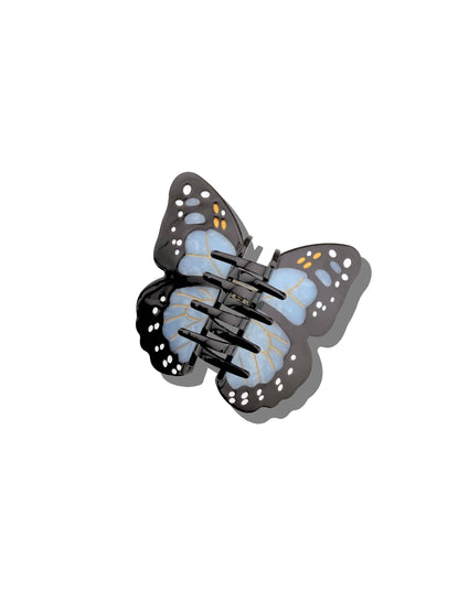 Back of the blue butterfly claw clip showing its teeth