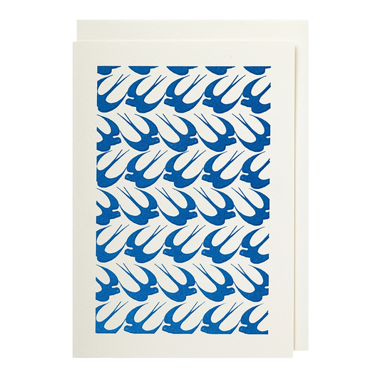 Cream card with a pattern of blue swallows