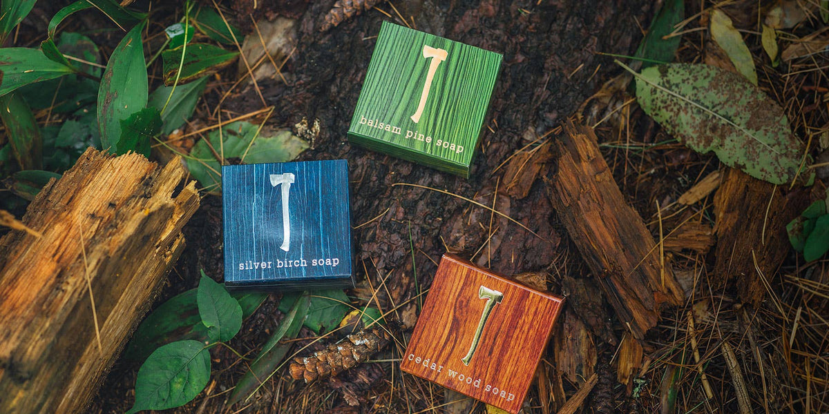 Kalastyle soaps in colourful boxes on a forest floor