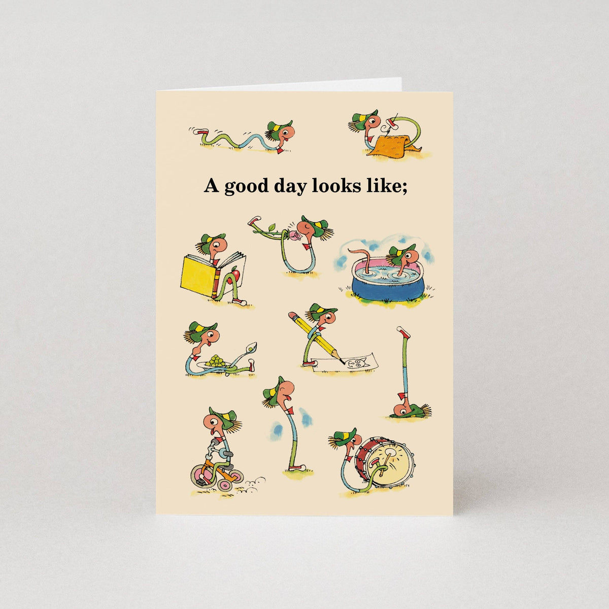 Richard Scarry card with Lowly Worm doing everyday things: A good day looks like;
