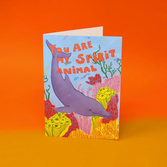 Card with a purple dolphin among coral: You are my spirit animal