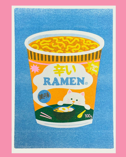 Naomi Wilkinson A4 riso print: a cup of ramen with a white cat on the label, on blue
