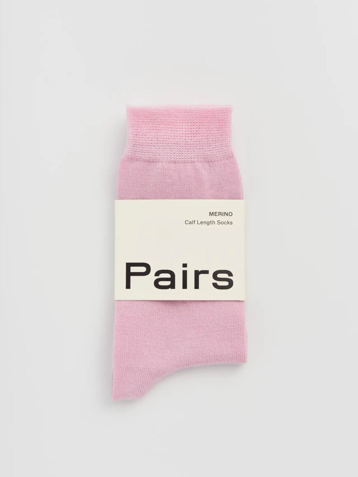 Pairs merino calf socks in sugar pink, medium, with a Pairs paper band