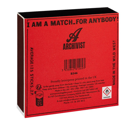 Back of the Cowgirl matchbox with the Archivist logo and safety information