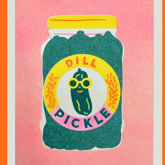 Naomi Wilkinson A5 riso print: a jar of dill pickles with a pickle in sunglasses, on pink