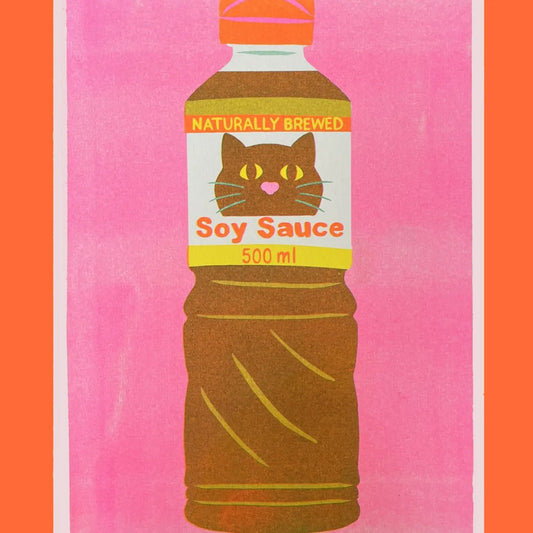 Naomi Wilkinson A4 riso print: a soy sauce bottle with a cat on the label, on pink