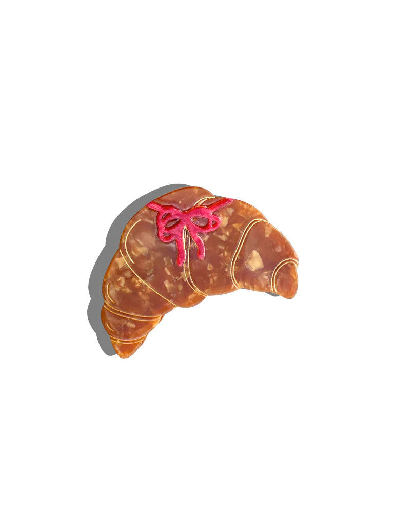 Solar Eclipse croissant claw clip with a red bow