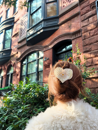 Celestial heart clip in auburn hair