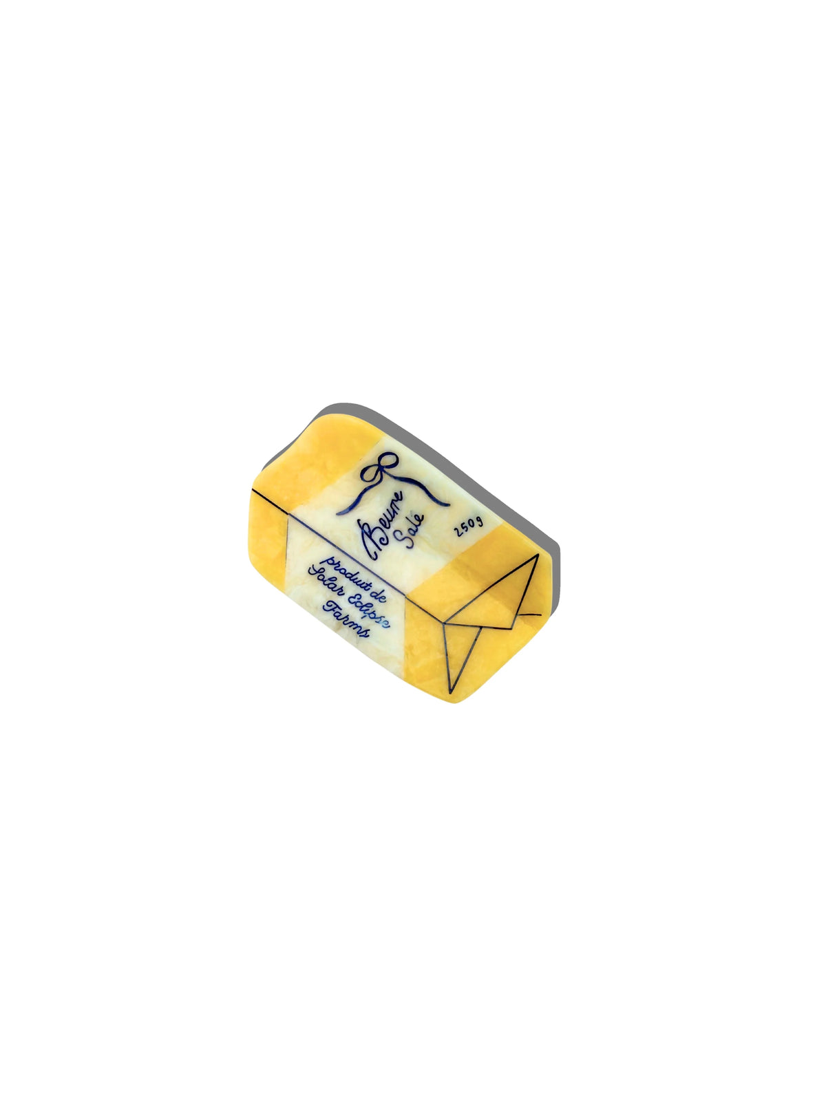 Solar Eclipse French butter claw clip: a yellow wrapped block of butter